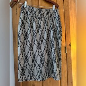 Very pretty skirt pull on style stretchy, black lace over nude underlay